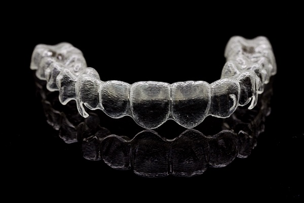 Does Wearing Invisalign® Invisible Braces Hurt? - Palm Beach